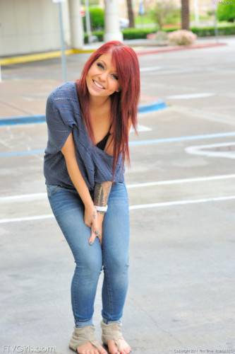 Redhead Hottie Madelyn Monroe Pulls Down Her Tight Jeans To Show Her Ass And Smooth Pussy on picsofsex.com